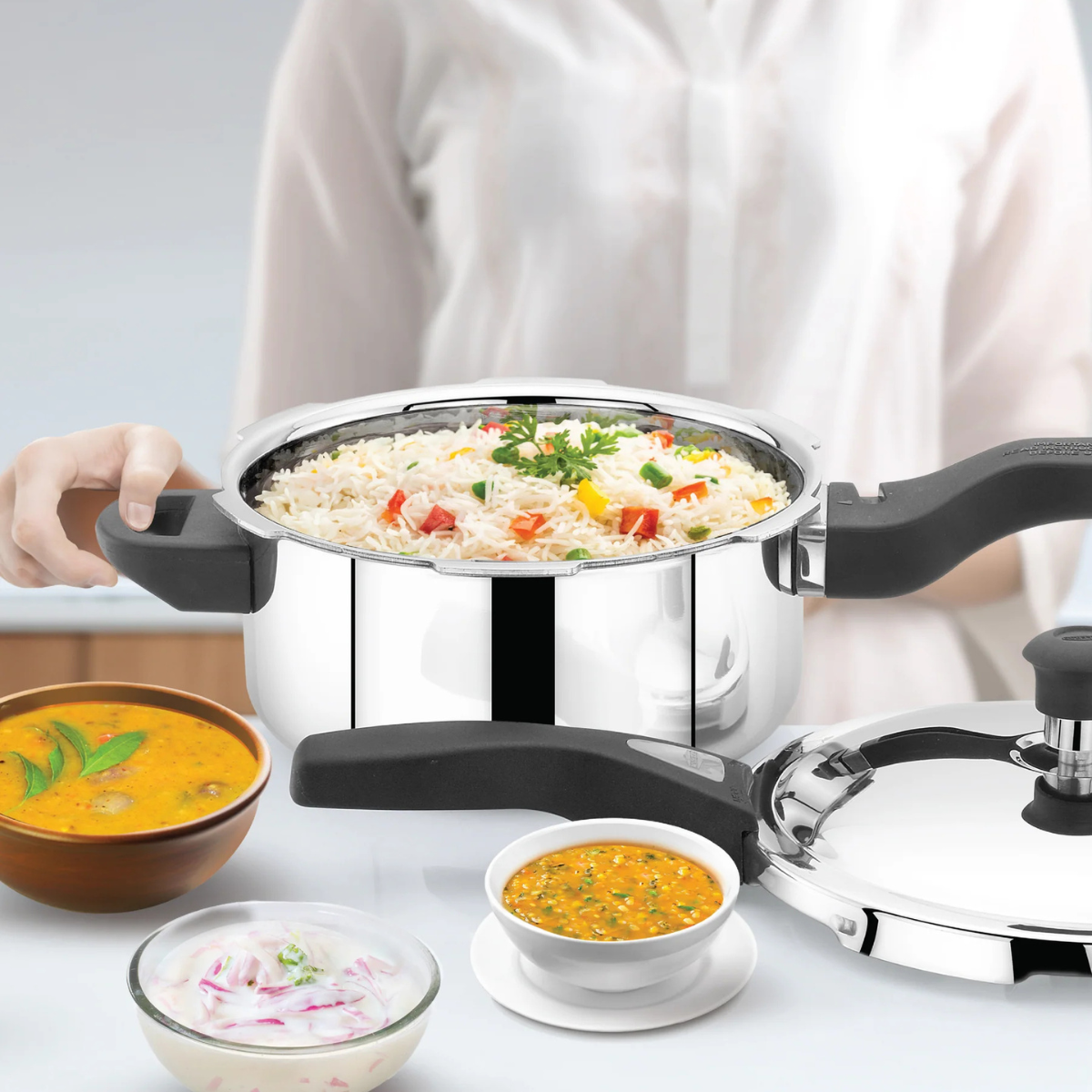 Navarasa Triply Pressure Cooker | Outer Lid | Stainless Steel | 3 L - Induction Compatible | ISI Certified SKU: NCTPPC01
